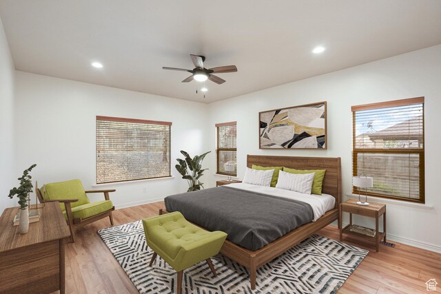 9226 N Mount Airey Dr W, Eagle Mountain, UT 84005 - bedroom featuring light wood-type flooring, baseboards, recessed lighting, and ceiling fan