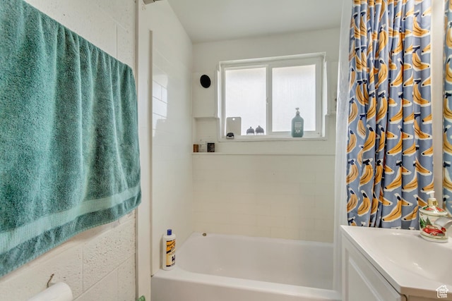 full bathroom featuring shower / tub combo and vanity