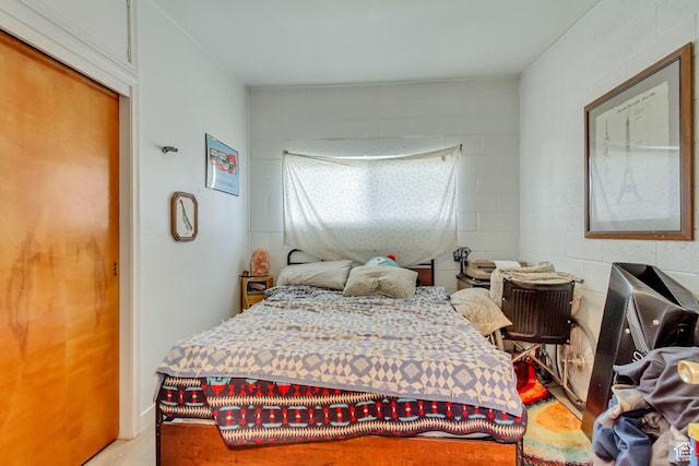bedroom featuring wood finished floors