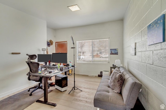 home office with light wood-type flooring