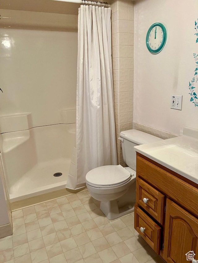 273 S 7th St S, Montpelier, ID 83254 - full bath featuring a stall shower, toilet, and vanity