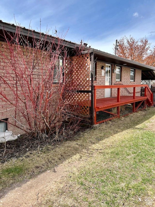 273 S 7th St S, Montpelier, ID 83254 - back of property with a wooden deck and a yard