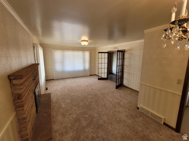273 S 7th St S, Montpelier, ID 83254 - unfurnished living room featuring crown molding and carpet floors