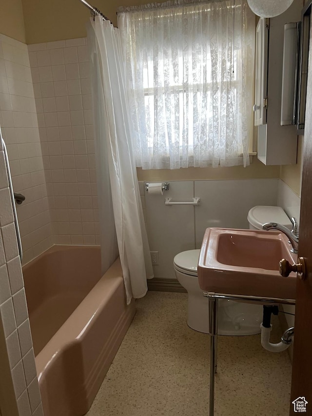 273 S 7th St S, Montpelier, ID 83254 - bathroom with toilet, shower / tub combo with curtain, and a sink