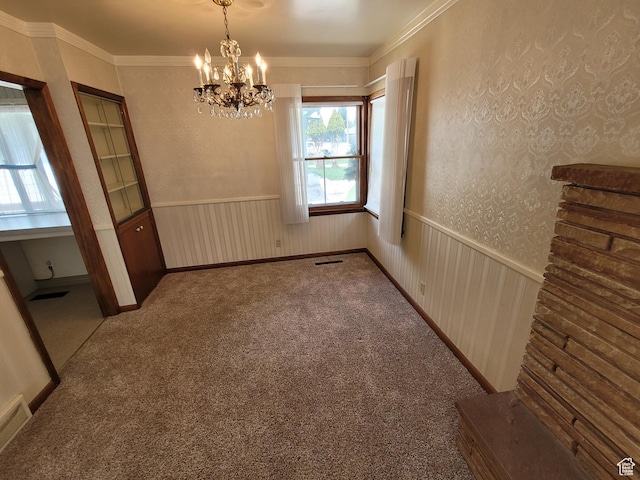 273 S 7th St S, Montpelier, ID 83254 - carpeted spare room featuring a chandelier, crown molding, and a wainscoted wall
