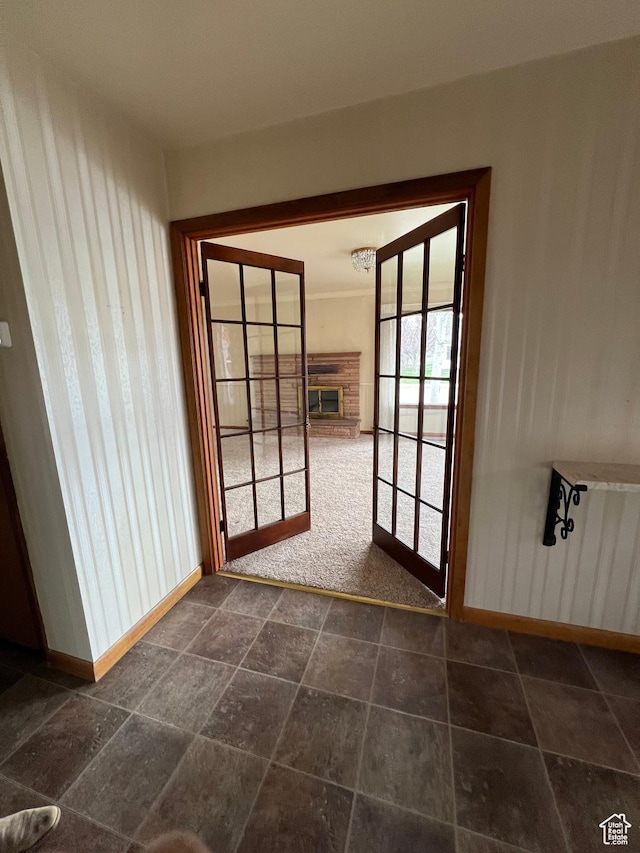 273 S 7th St S, Montpelier, ID 83254 - doorway to outside with a glass covered fireplace and baseboards