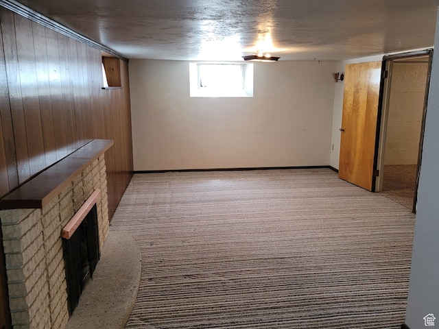 273 S 7th St S, Montpelier, ID 83254 - below grade area with a stone fireplace and light carpet