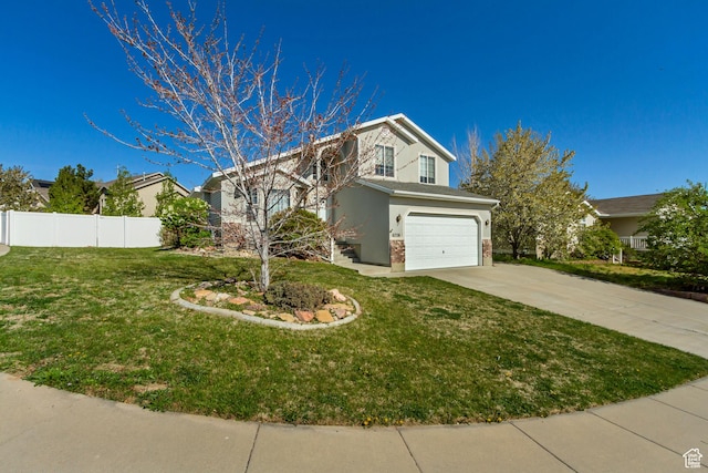 6706 S Adventure Way, West Jordan, UT 84084 - view of front of house featuring an attached garage, stucco siding, fence, concrete driveway, and a front lawn