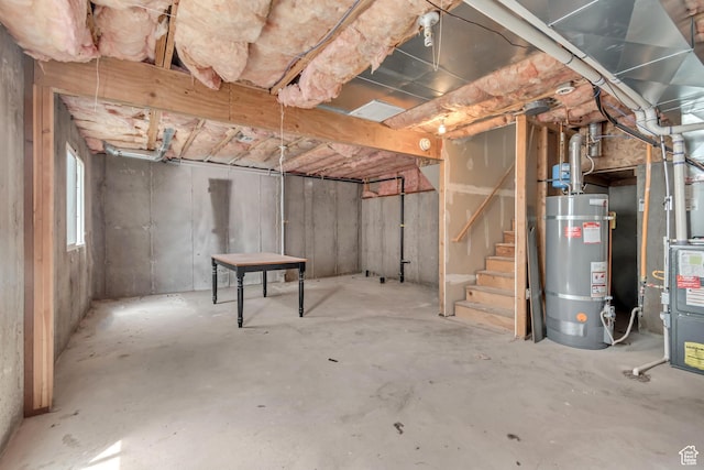 6706 S Adventure Way, West Jordan, UT 84084 - below grade area featuring water heater and stairs