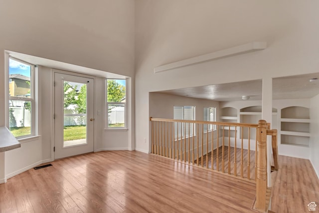 6706 S Adventure Way, West Jordan, UT 84084 - interior space featuring baseboards, visible vents, and wood finished floors
