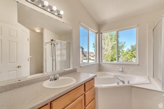 6706 S Adventure Way, West Jordan, UT 84084 - full bathroom featuring vanity, a shower stall, lofted ceiling, and a bath