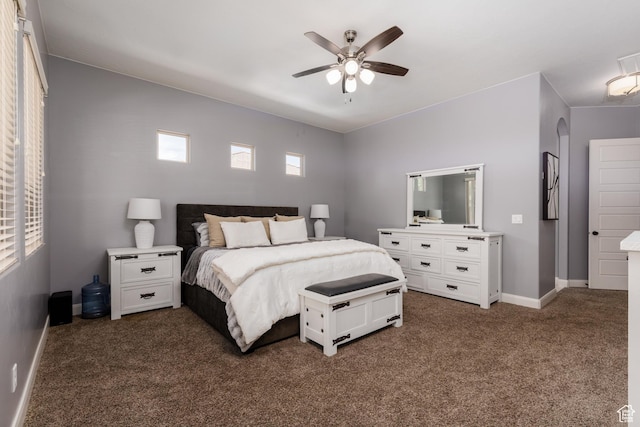 2562 S 4010 W, Hurricane, UT 84737 - bedroom with dark colored carpet, a ceiling fan, and baseboards