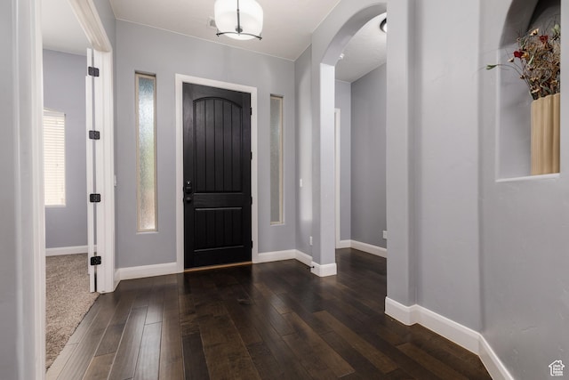 2562 S 4010 W, Hurricane, UT 84737 - entrance foyer with arched walkways, baseboards, and dark wood-style flooring