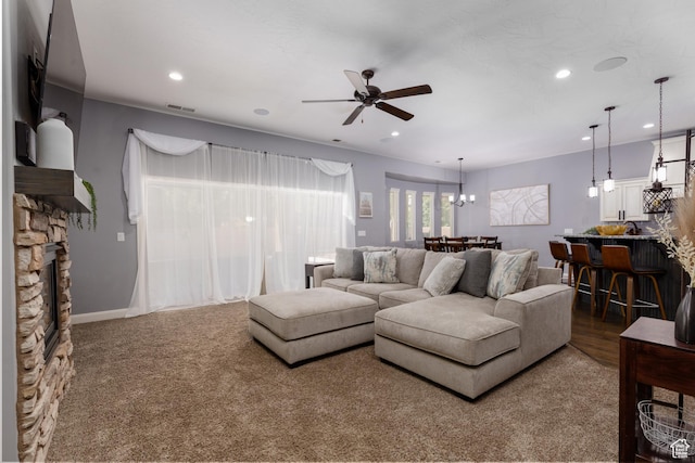 2562 S 4010 W, Hurricane, UT 84737 - living area with recessed lighting, visible vents, a fireplace, and ceiling fan with notable chandelier