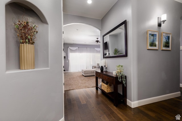 2562 S 4010 W, Hurricane, UT 84737 - hall featuring arched walkways, baseboards, and dark wood-type flooring