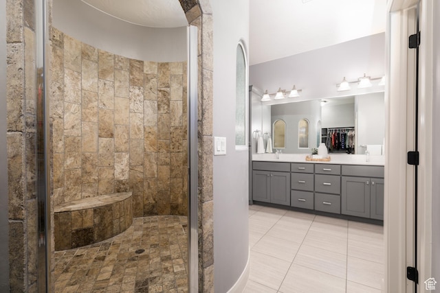 2562 S 4010 W, Hurricane, UT 84737 - bathroom with tile patterned flooring, double vanity, and a stall shower
