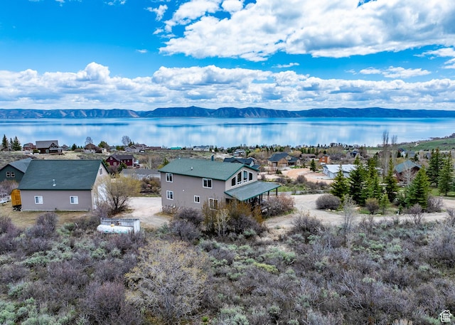aerial view with a water and mountain view