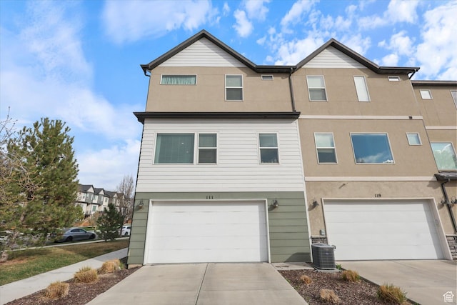 111 S 1800 W, Pleasant Grove, UT 84062 - townhome / multi-family property featuring stucco siding, central AC unit, and driveway