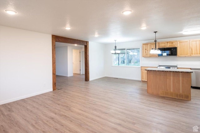 2389 S 4300 W, Taylor, UT 84401 - kitchen featuring a center island, black microwave, light wood-type flooring, and light brown cabinets