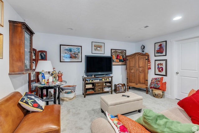 living area with recessed lighting, carpet, visible vents, and baseboards