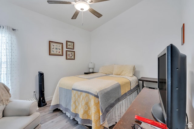 bedroom featuring ceiling fan and wood finished floors