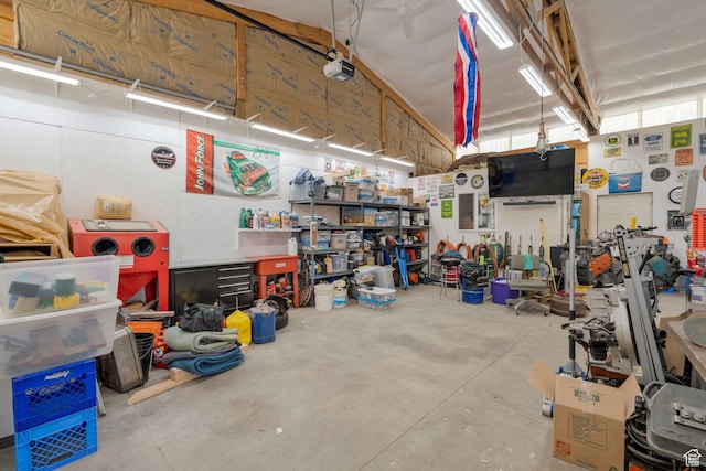4577 S 4300 W, West Haven, UT 84401 - garage featuring a garage door opener and a workshop area