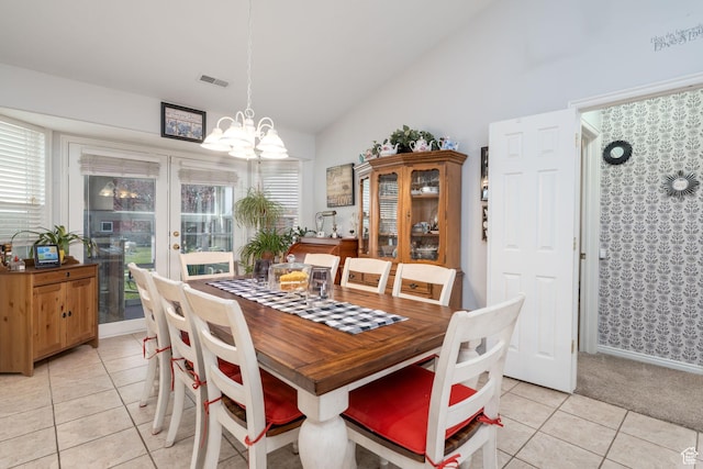 4577 S 4300 W, West Haven, UT 84401 - dining area featuring lofted ceiling, a notable chandelier, visible vents, and light tile patterned floors