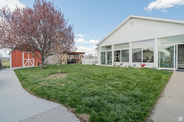 4577 S 4300 W, West Haven, UT 84401 - view of yard with an outdoor structure and a sunroom