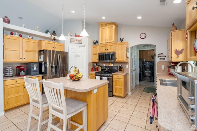 4577 S 4300 W, West Haven, UT 84401 - kitchen featuring light brown cabinets, decorative backsplash, light tile patterned floors, stainless steel appliances, and light countertops