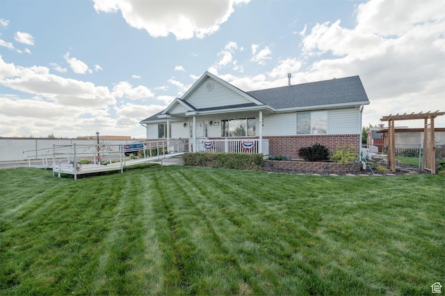 4577 S 4300 W, West Haven, UT 84401 - view of front of home featuring brick siding, a shingled roof, a front yard, and covered porch
