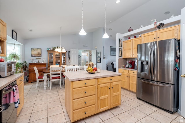4577 S 4300 W, West Haven, UT 84401 - kitchen with vaulted ceiling, light brown cabinetry, light tile patterned floors, light countertops, and stainless steel refrigerator with ice dispenser