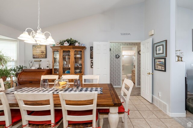 4577 S 4300 W, West Haven, UT 84401 - dining room with baseboards, high vaulted ceiling, a chandelier, and light tile patterned floors