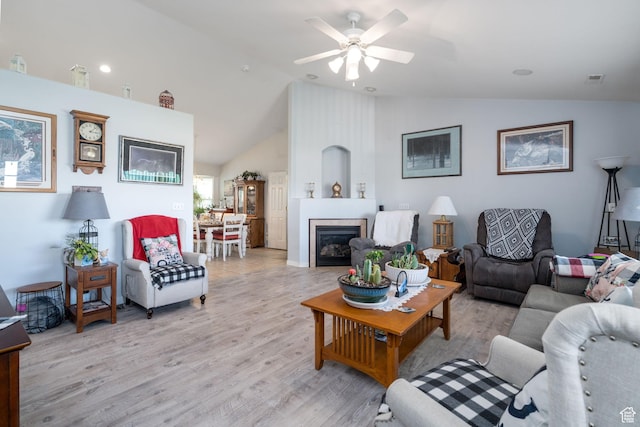 4577 S 4300 W, West Haven, UT 84401 - living room with ceiling fan, lofted ceiling, a fireplace, and light wood-style flooring