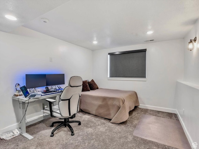 bedroom featuring carpet flooring, visible vents, and baseboards