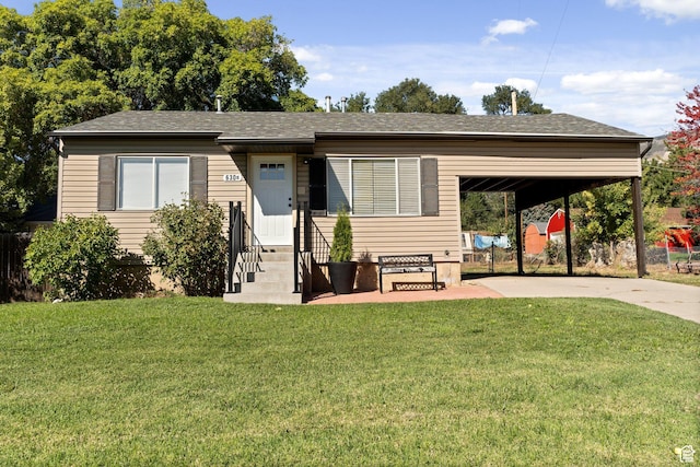 630 E 2550 N, North Ogden, UT 84414 - view of front of property featuring a front lawn, an attached carport, concrete driveway, entry steps, and a shingled roof