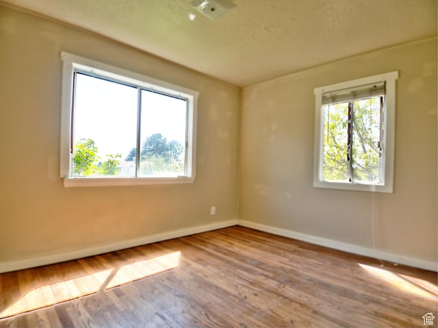 630 E 2550 N, North Ogden, UT 84414 - empty room featuring baseboards and wood finished floors