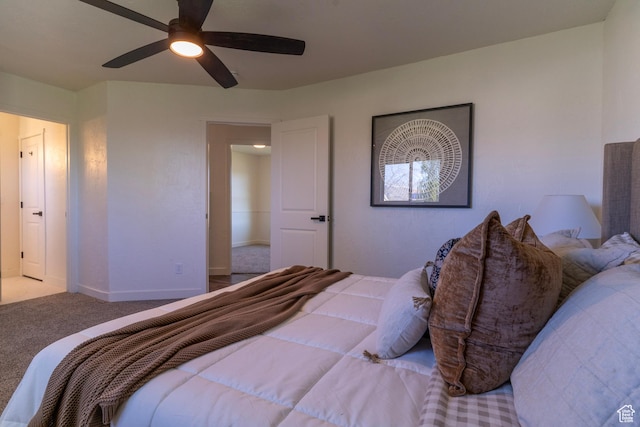 bedroom featuring a ceiling fan, carpet flooring, and baseboards