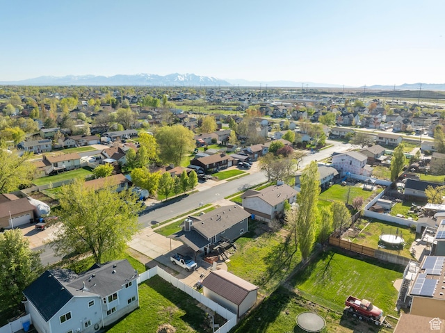 aerial view with a mountain view and a residential view