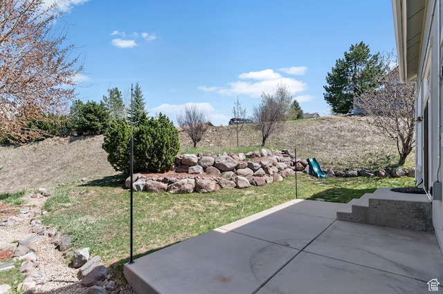 view of yard with a patio area