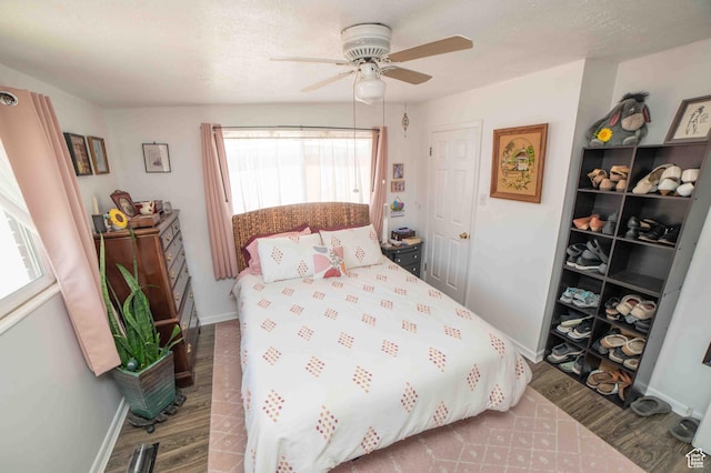 3724 S Carolyn St, Millcreek, UT 84106 - bedroom featuring baseboards, a ceiling fan, and wood finished floors