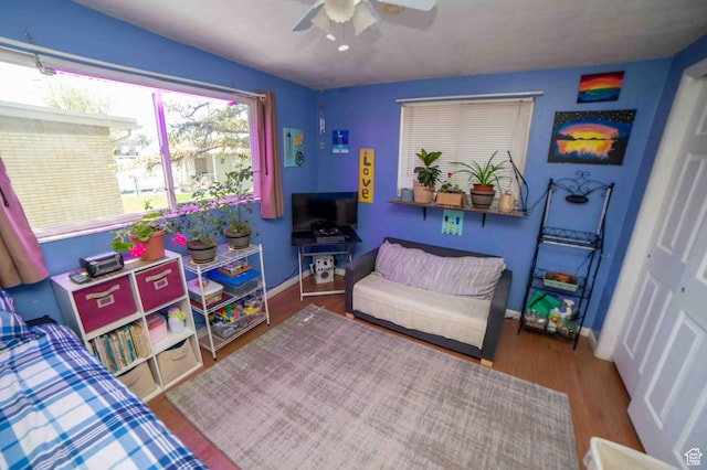 3724 S Carolyn St, Millcreek, UT 84106 - bedroom featuring baseboards, ceiling fan, and wood finished floors
