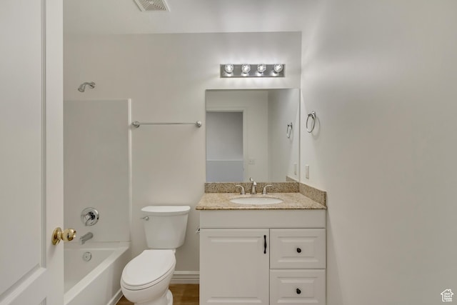 bathroom featuring toilet, vanity, washtub / shower combination, and visible vents