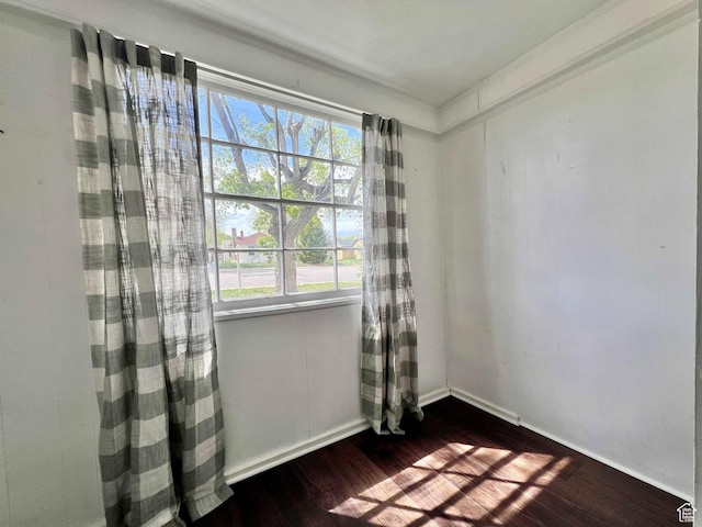 152 N 400 E, Vernal, UT 84078 - spare room featuring baseboards and dark wood-style flooring
