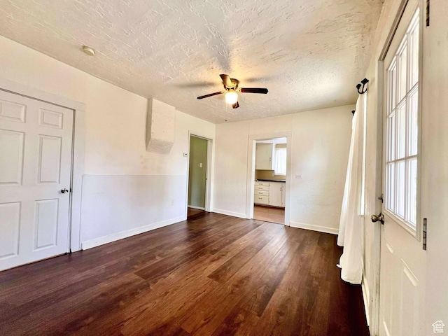 152 N 400 E, Vernal, UT 84078 - empty room with a textured ceiling, a wealth of natural light, baseboards, a ceiling fan, and wood finished floors