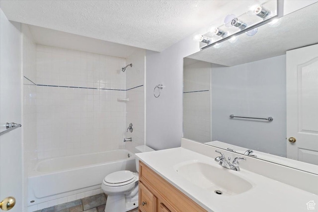 bathroom with shower / bathtub combination, a textured ceiling, toilet, and vanity