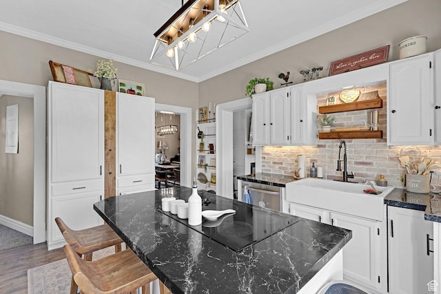 453 N 200 W, Brigham City, UT 84302 - kitchen with backsplash, an inviting chandelier, and white cabinetry