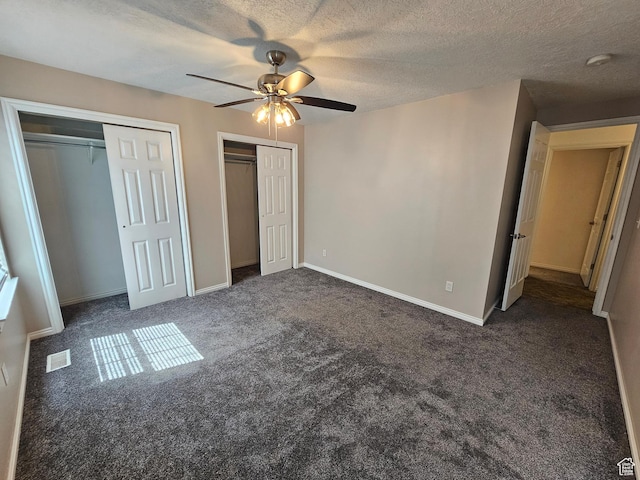 723 E 200 N, Orem, UT 84097 - unfurnished bedroom with visible vents, multiple closets, a textured ceiling, a ceiling fan, and carpet