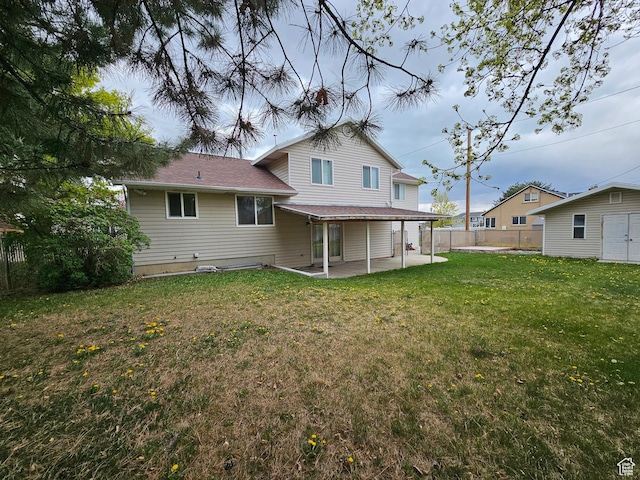 723 E 200 N, Orem, UT 84097 - back of property featuring a patio, fence, and a yard