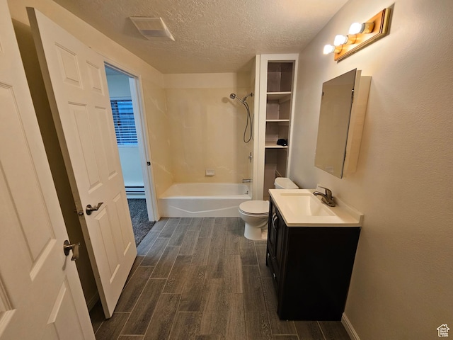 723 E 200 N, Orem, UT 84097 - full bath featuring vanity, wood finished floors, toilet, a textured ceiling, and a baseboard heating unit