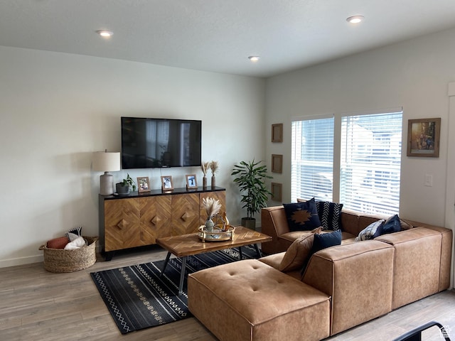 9372 N Scenic Mountain Dr W, Eagle Mountain, UT 84005 - living room with recessed lighting, baseboards, and light wood-type flooring